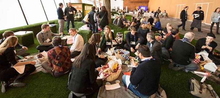 TED delegates at an indoor picnic - a great example of an innovative events idea