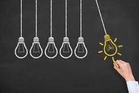 Lightbulbs representing hybrid conference creativity.